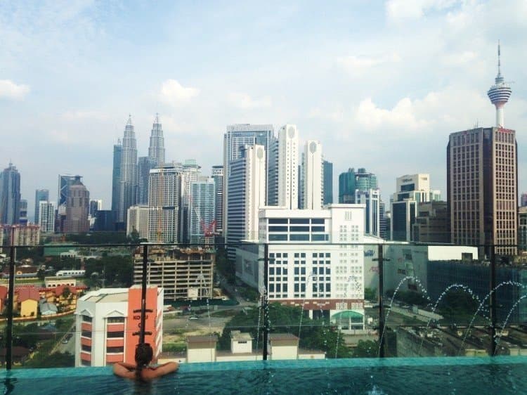 Kuala Lumpur skyline from the rooftop pool of WP Hotel - Ultimate 3 Week Itinerary for Singapore, Malaysia and Bali [+ Trip Costs]!